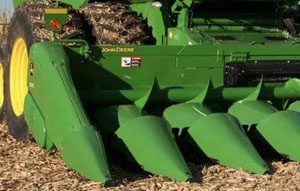 Corn heads for threshing machines